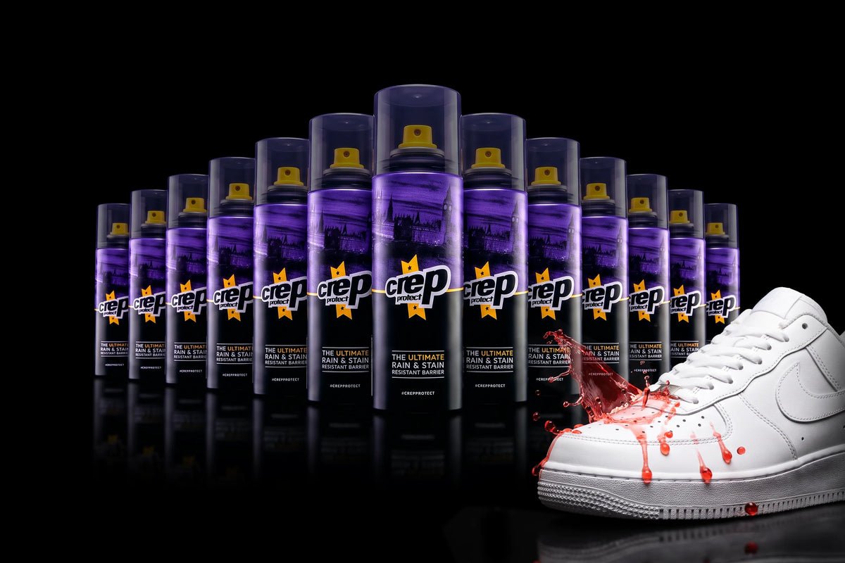 Crep Protect Spray cans with a stain-repelled white sneaker